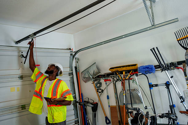 Professional Garage Door Panel Replacement technician working in Rapid City, MI